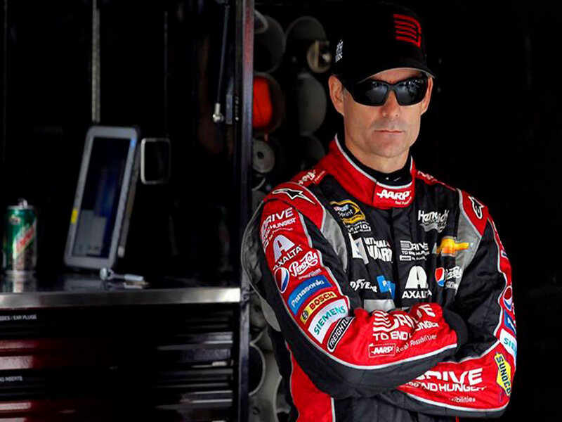 Man in Racing Suit — Black, Serious, Photograph