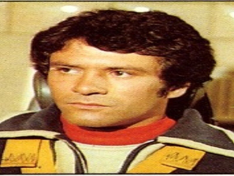 Man in Racing Suit — Black, Serious