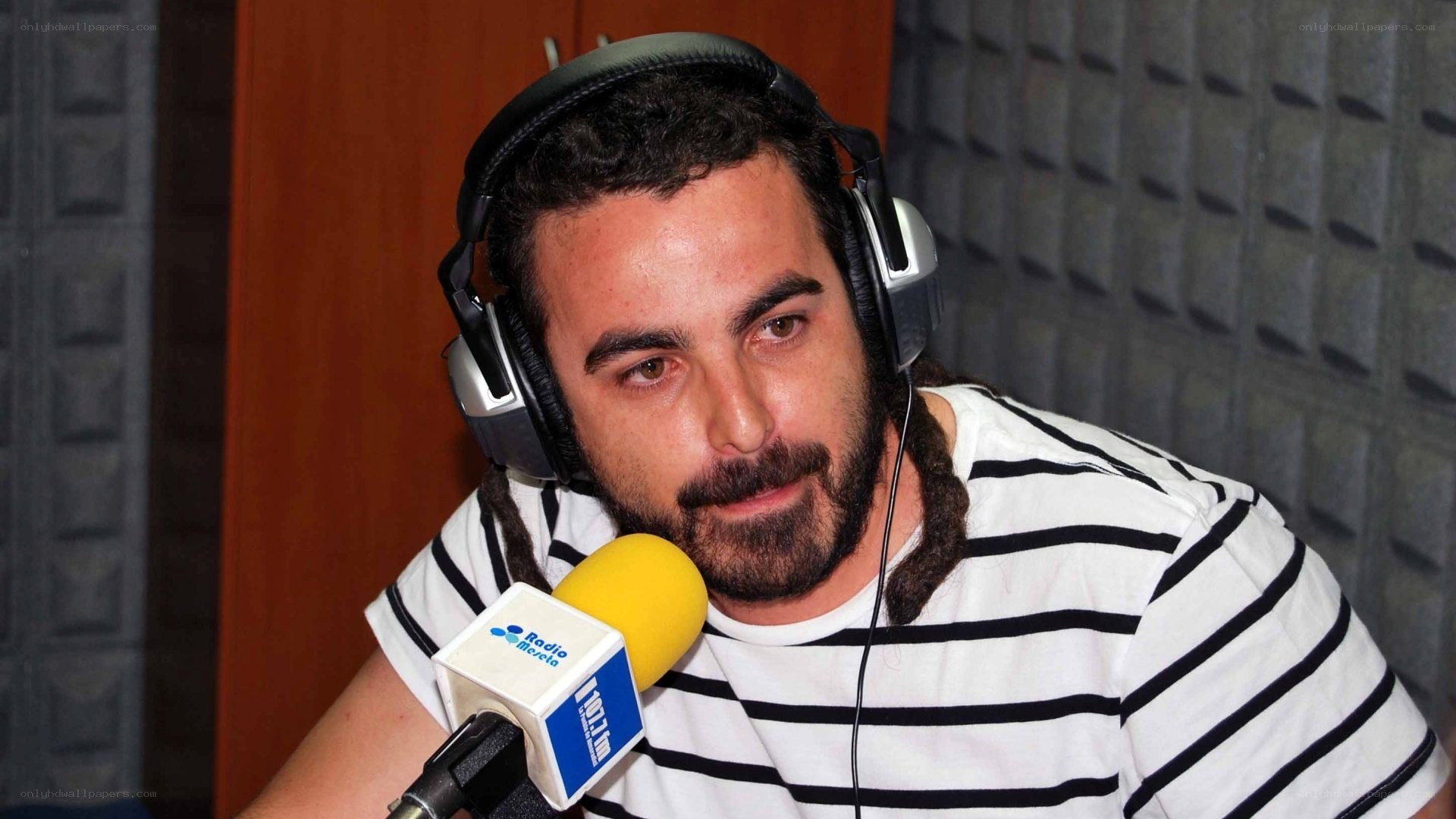 man in radio studio