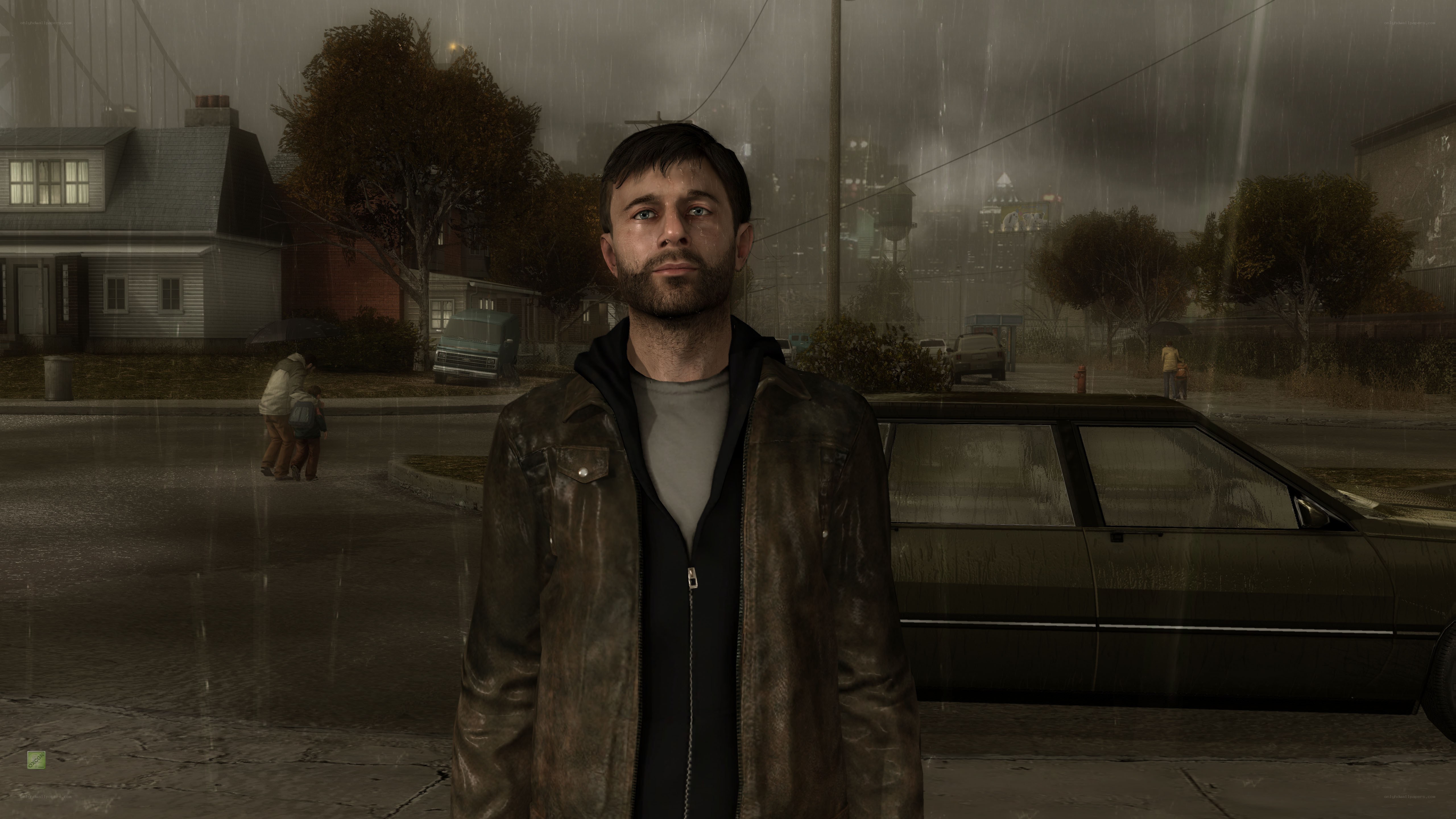 man in rain on street