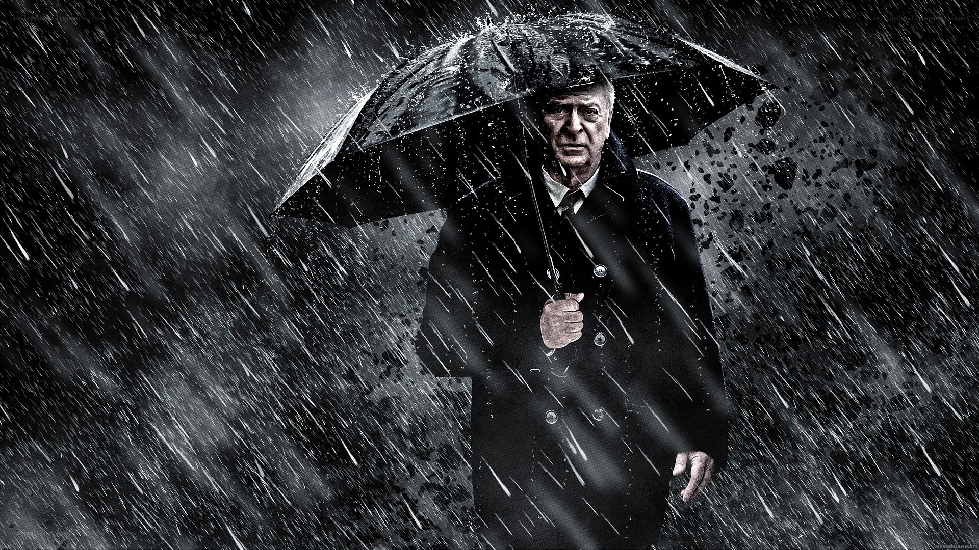 man in rain with umbrella