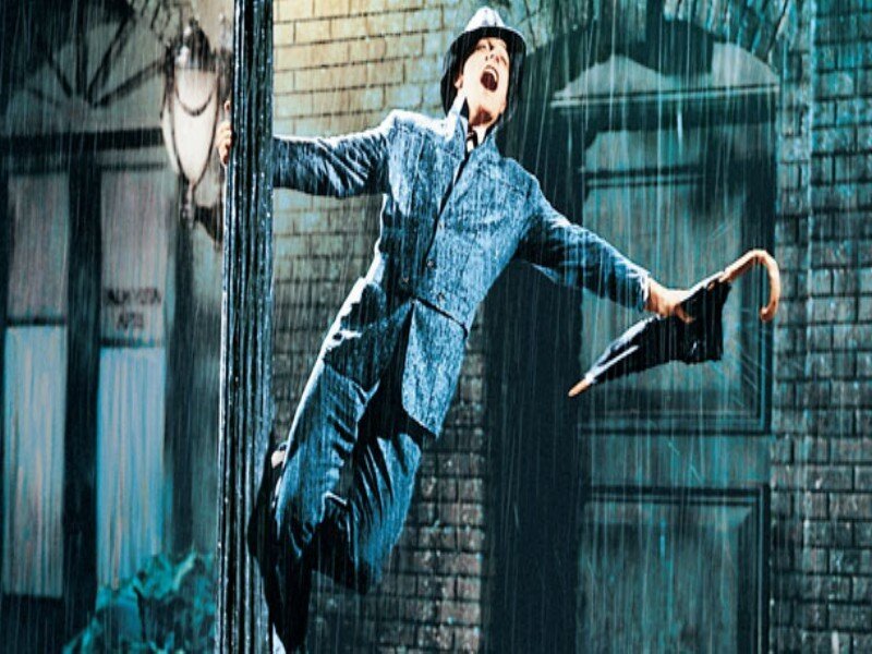 Man in Raincoat Dancing