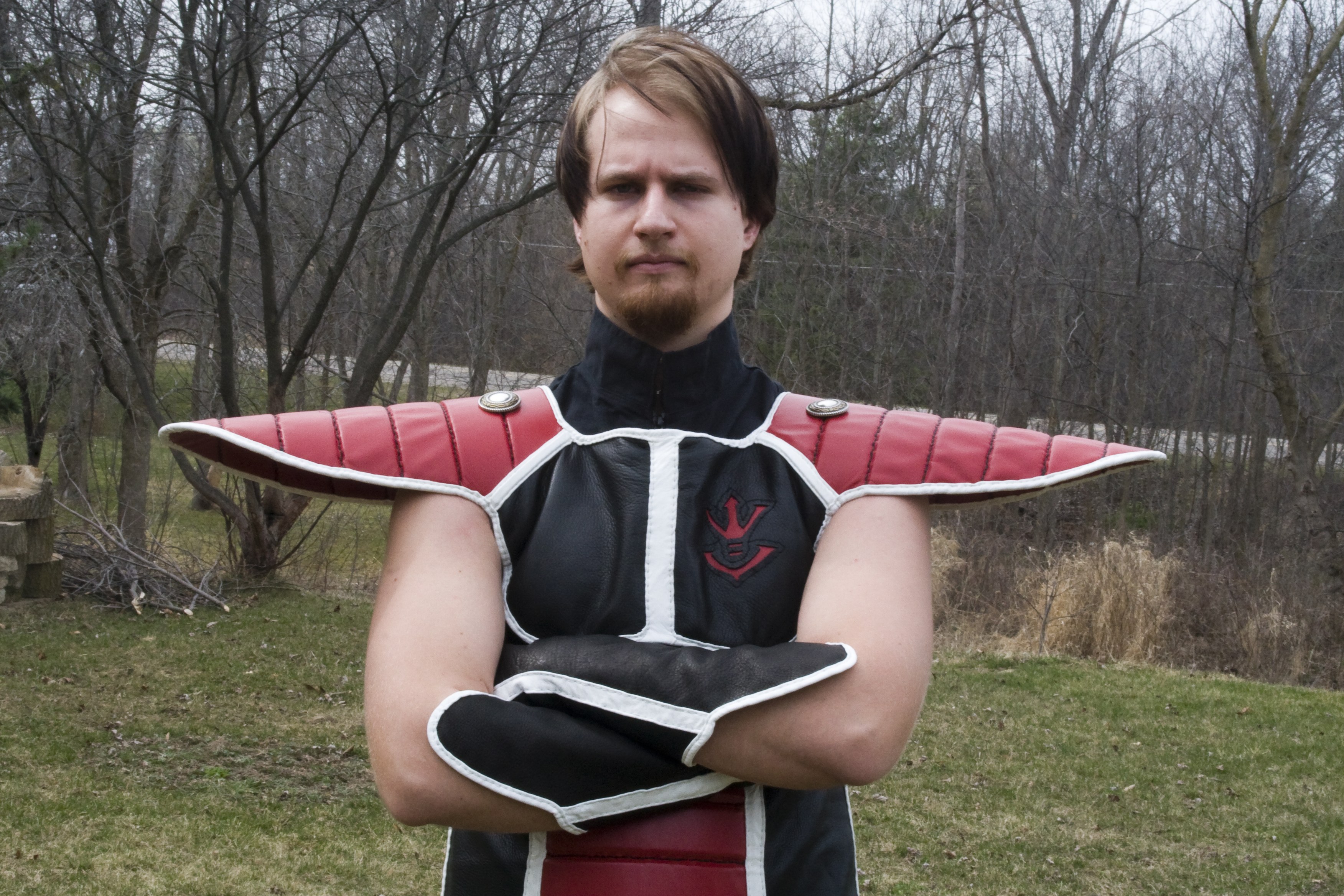 man in red and black costume