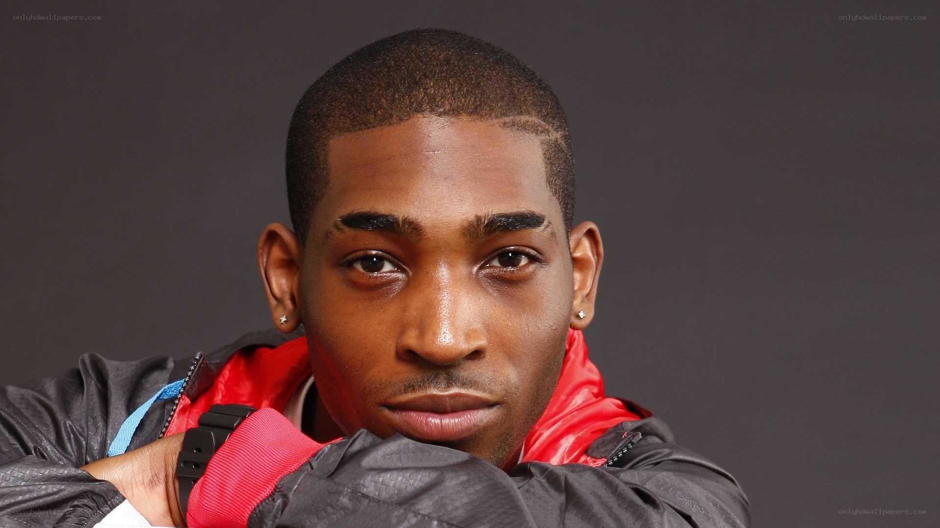man in red and black jacket