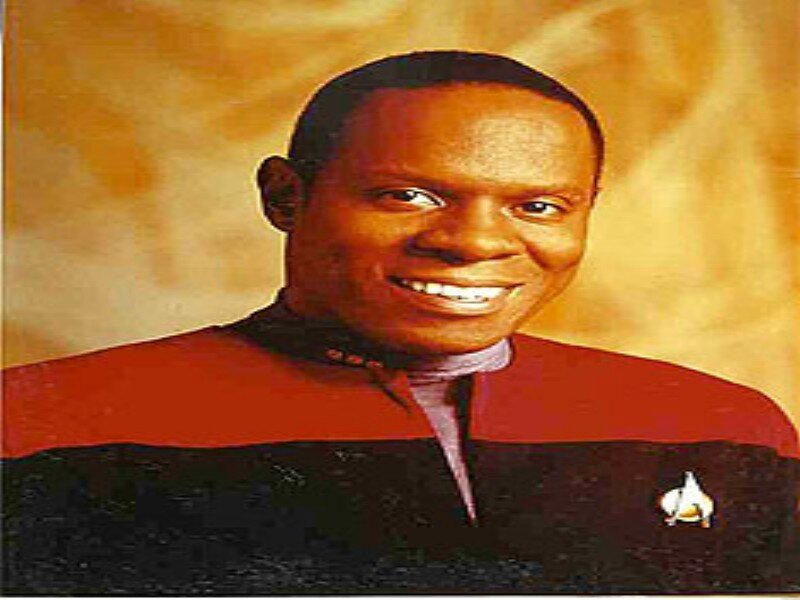 Man in Red and Black Uniform