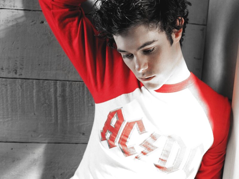 man in red and white shirt