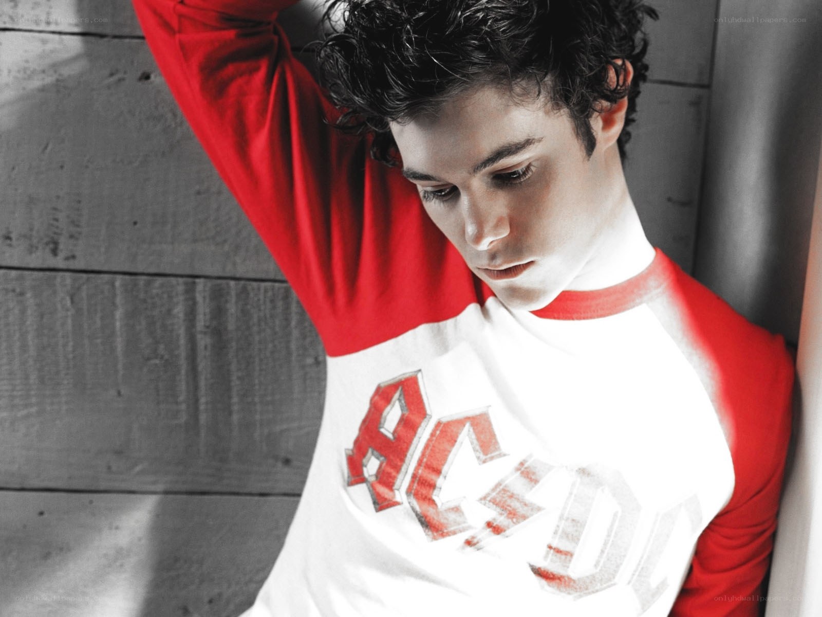 man in red and white shirt