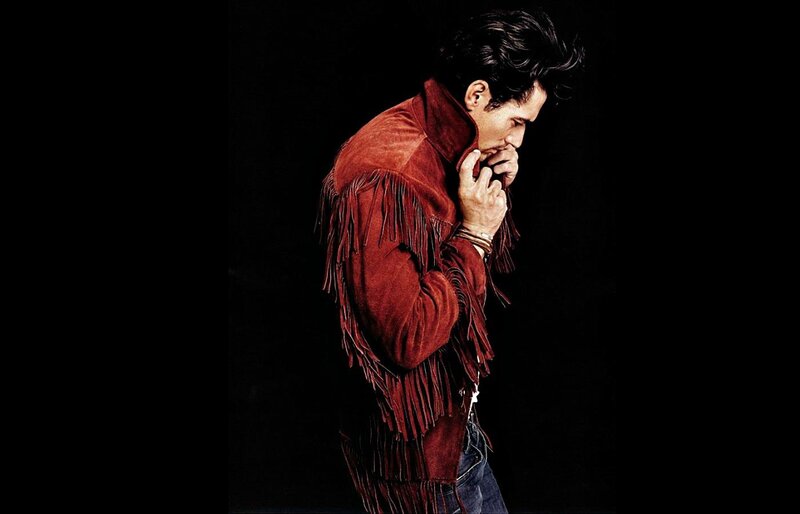 Man in Red Fringed Jacket