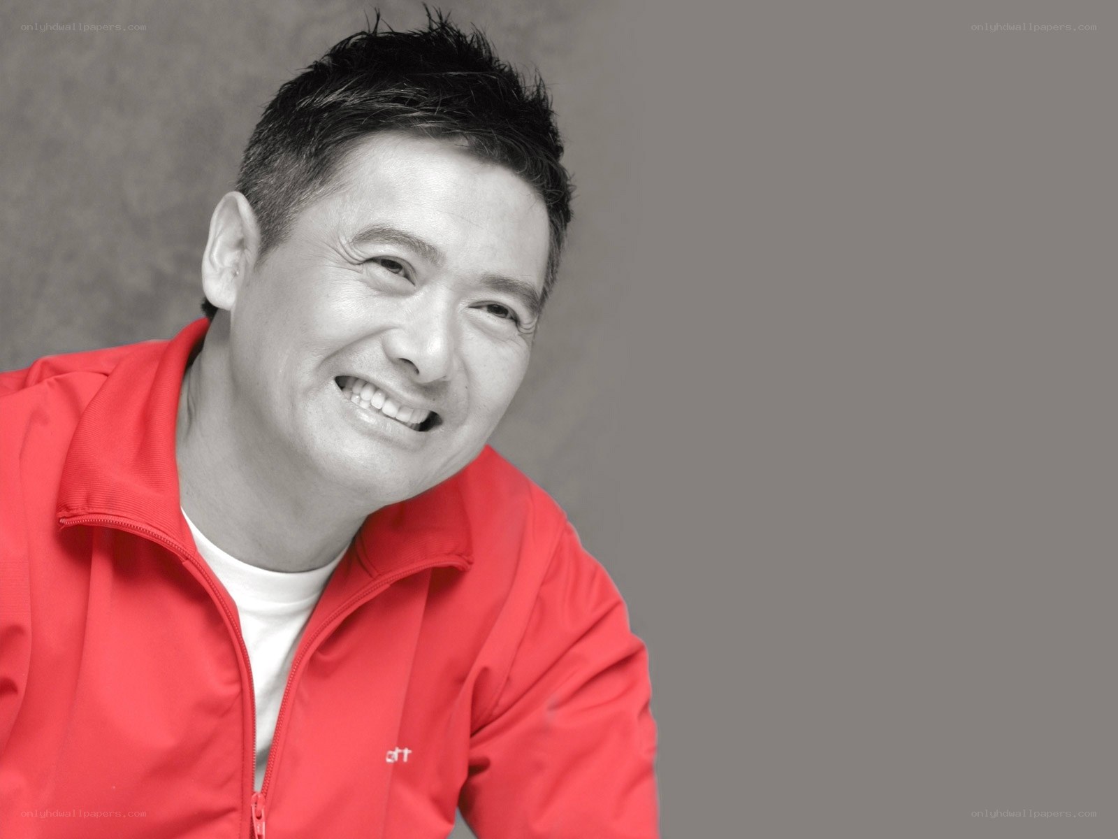 man in red jacket smiling