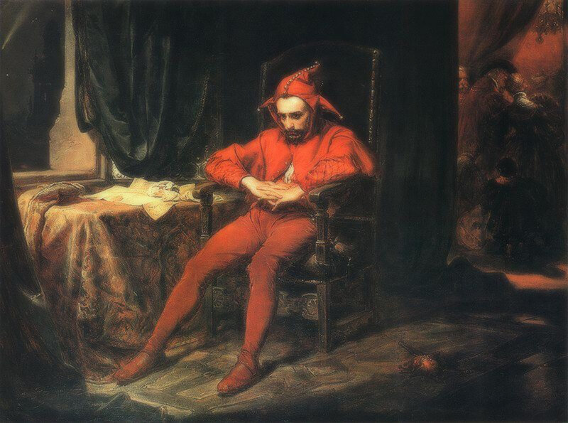 Man in red jester costume