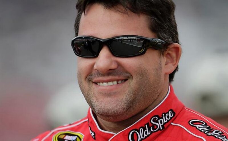 man in red racing suit