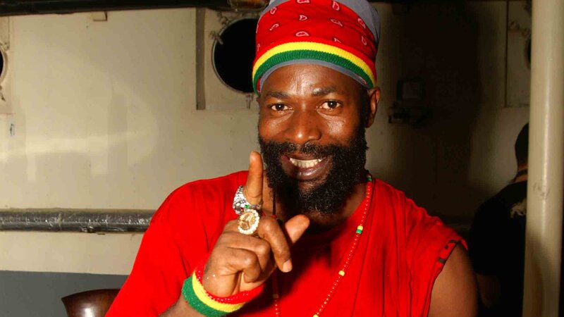 man in red rasta attire