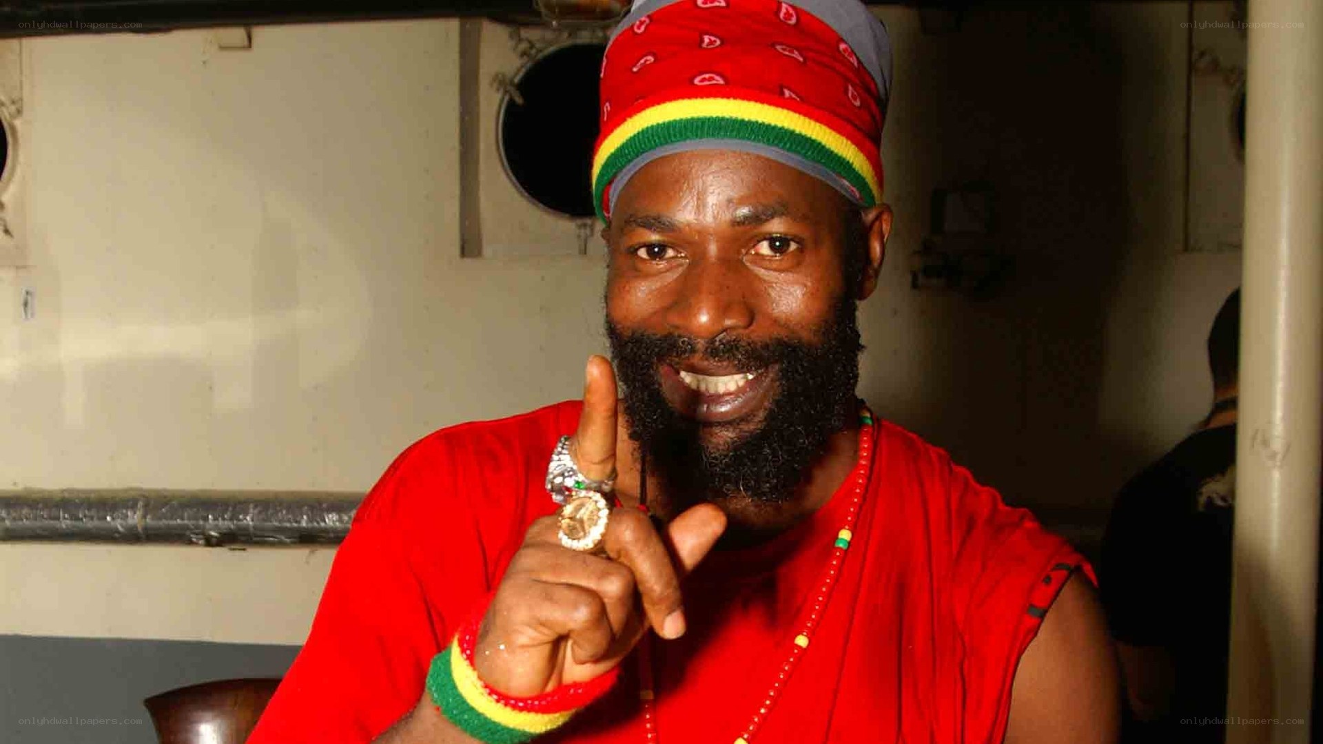 man in red rasta attire