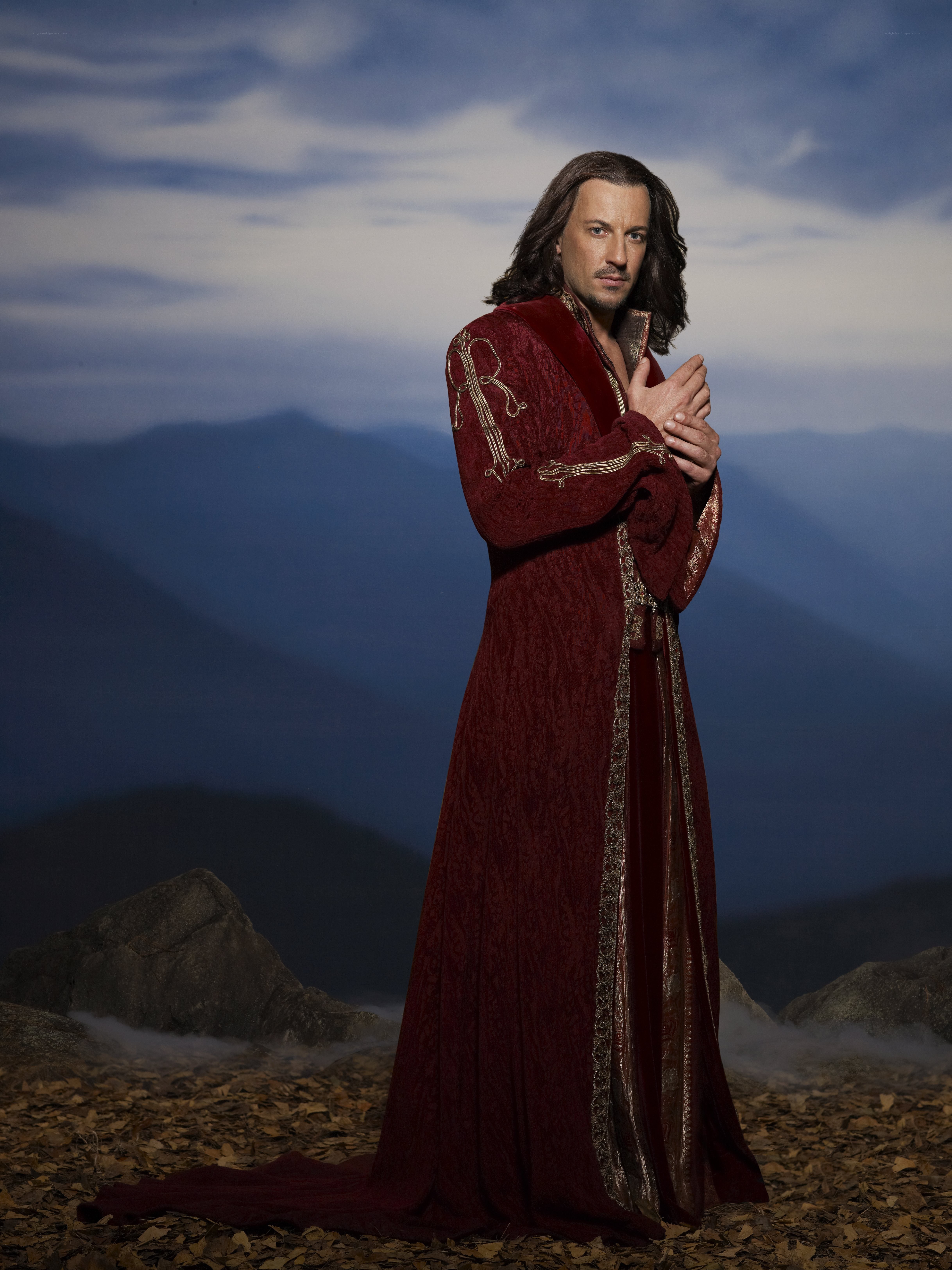 Man in red robe on mountain