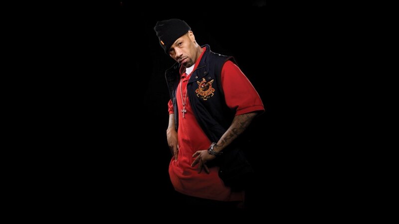 man in red shirt and beanie