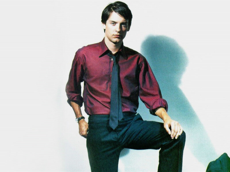 man in red shirt and tie