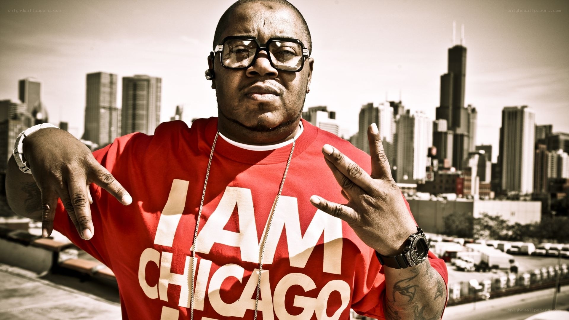 man in red shirt with chicago backdrop