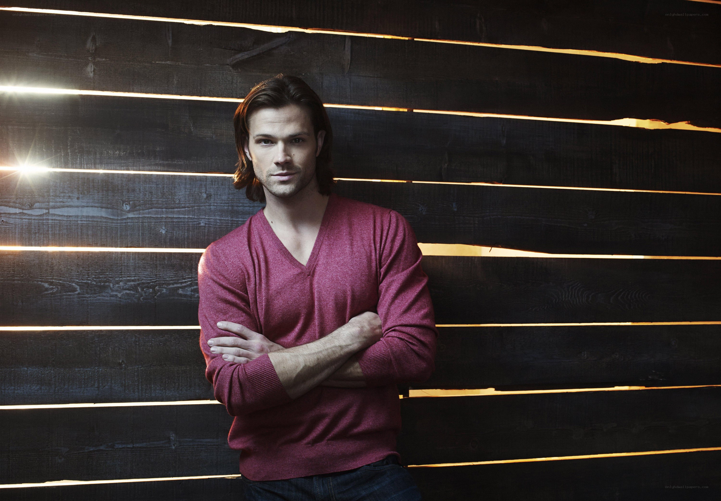man in red sweater standing
