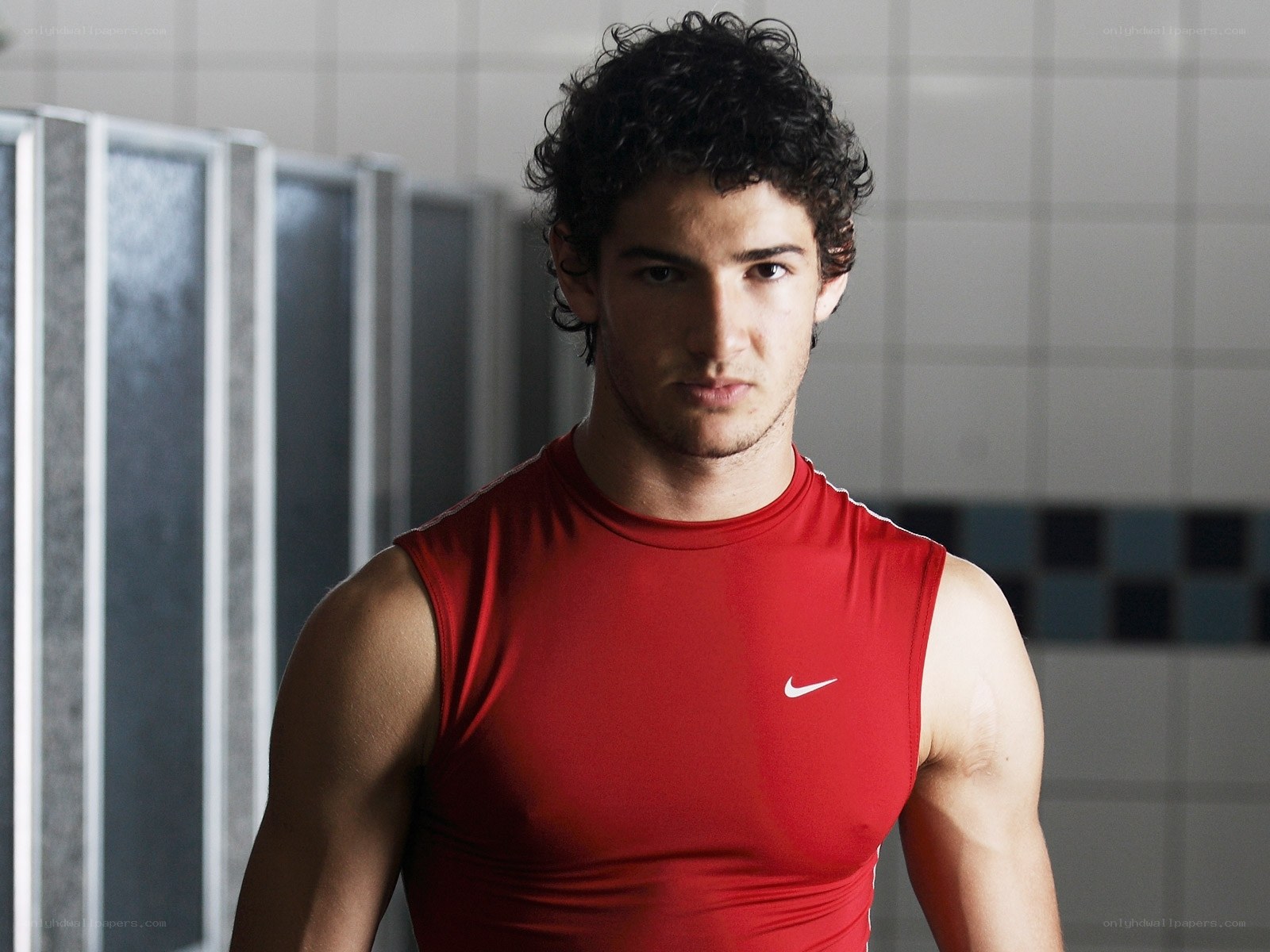 man in red tank top
