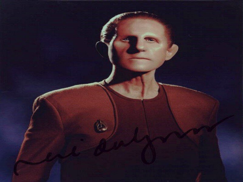 Man in Red Uniform — Dramatic, Photograph, Signature