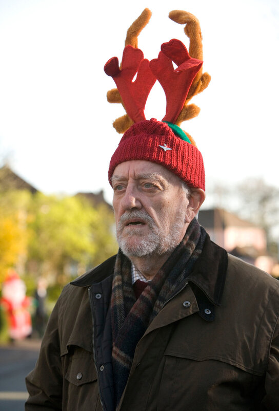 Man in reindeer antlers hat