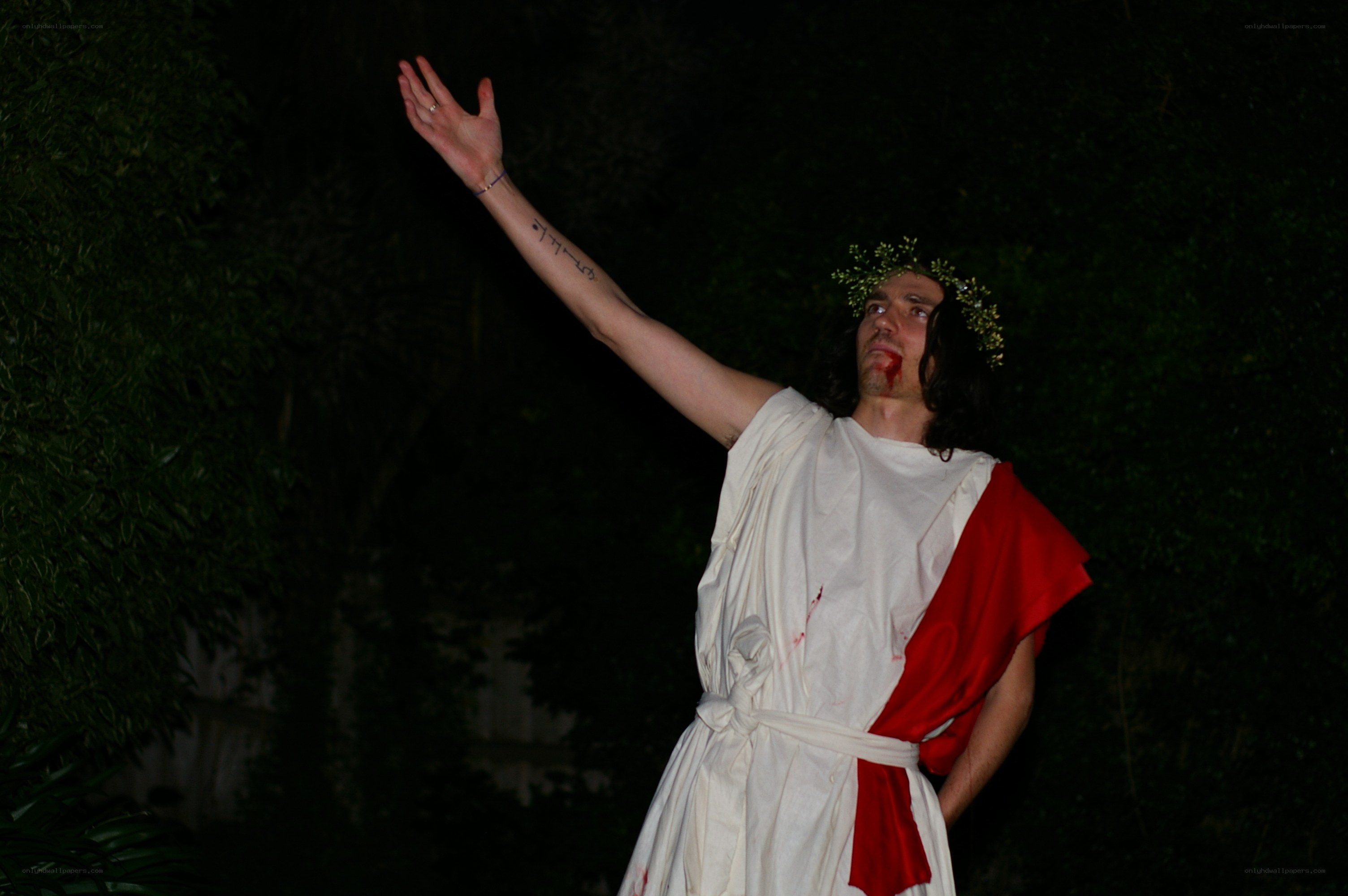man in robe with blood