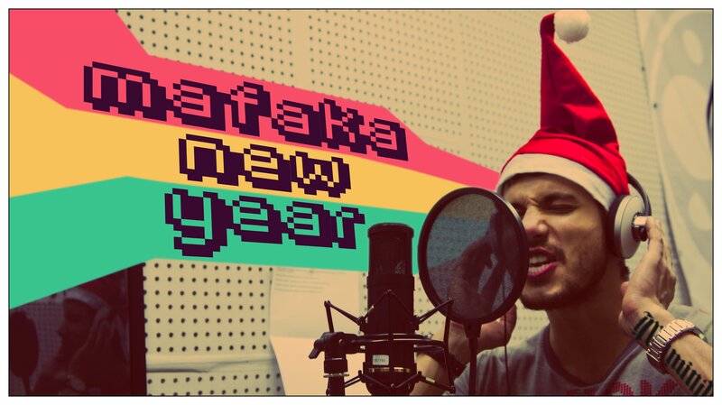 man in santa hat singing