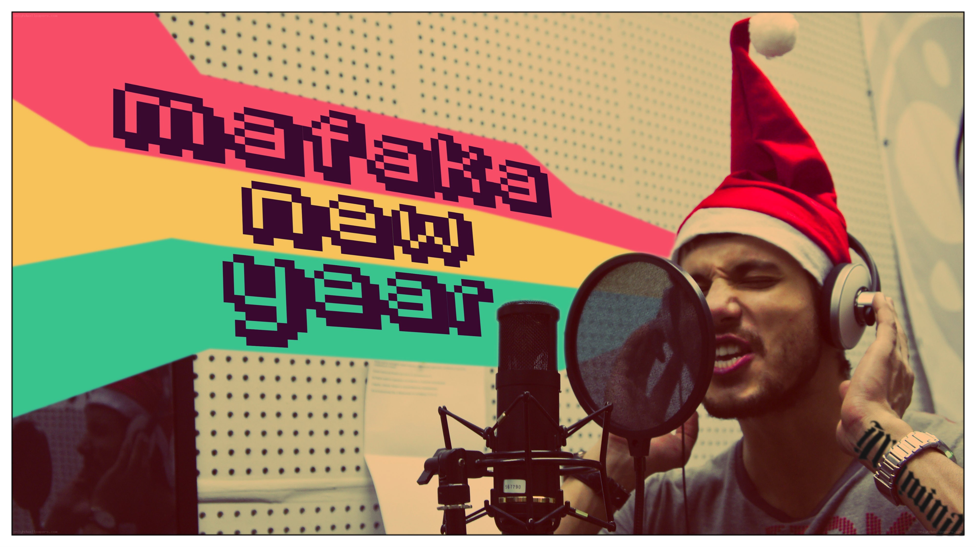 man in santa hat singing