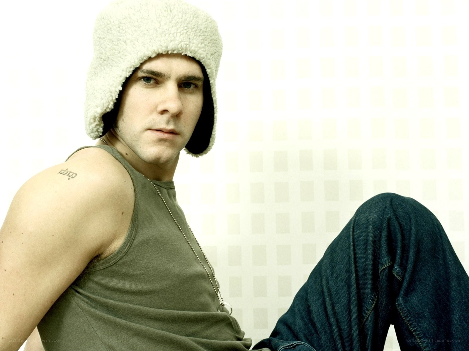 man in sheepskin hat