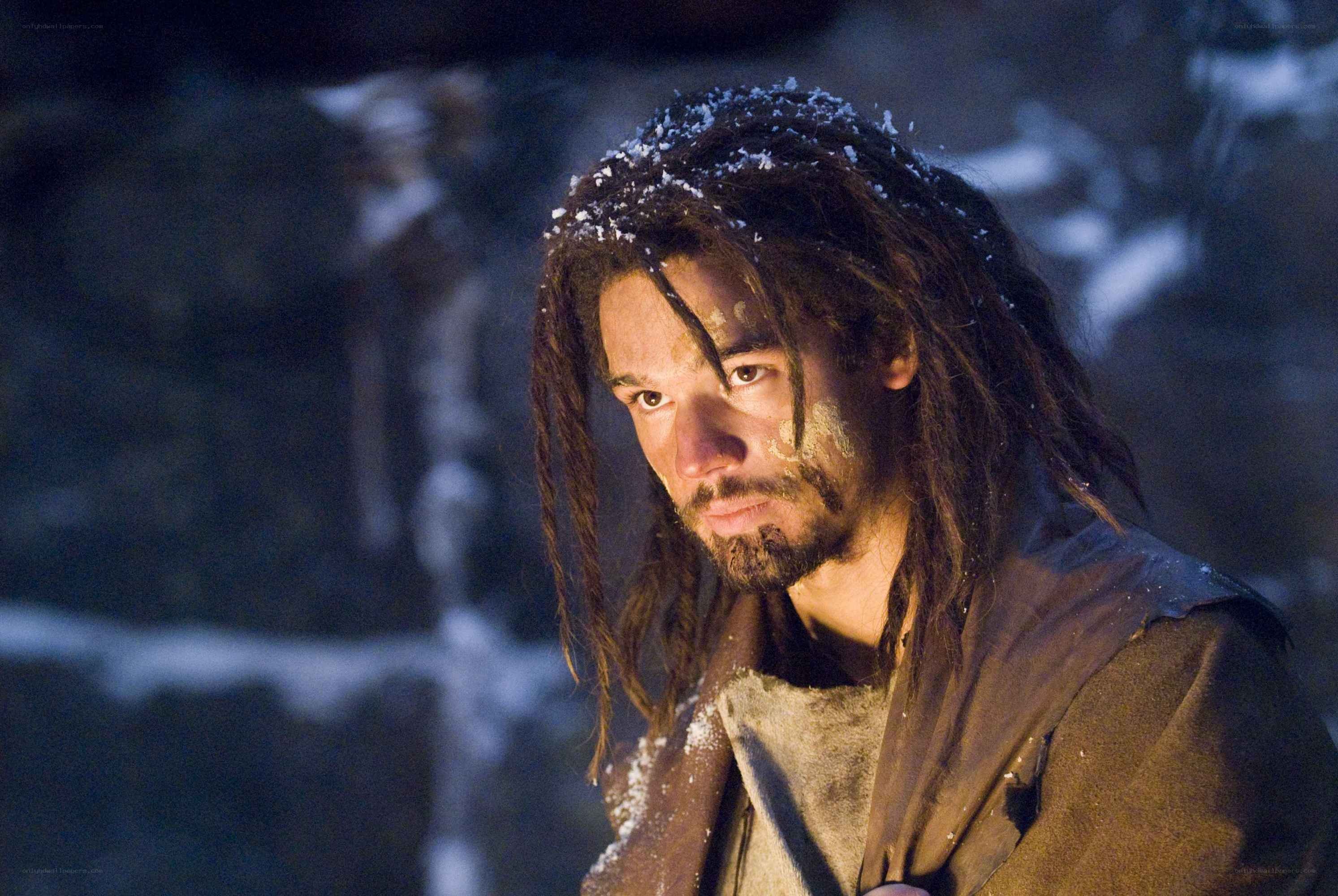man in snowy cave
