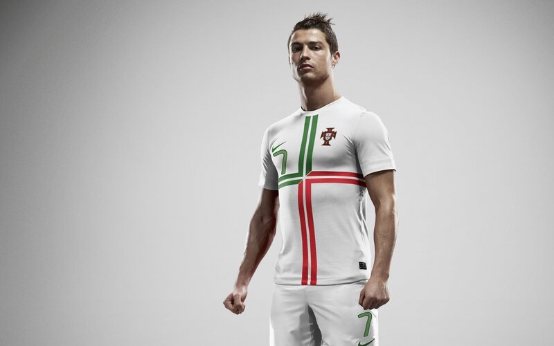 Man in Soccer Jersey — White, Serious