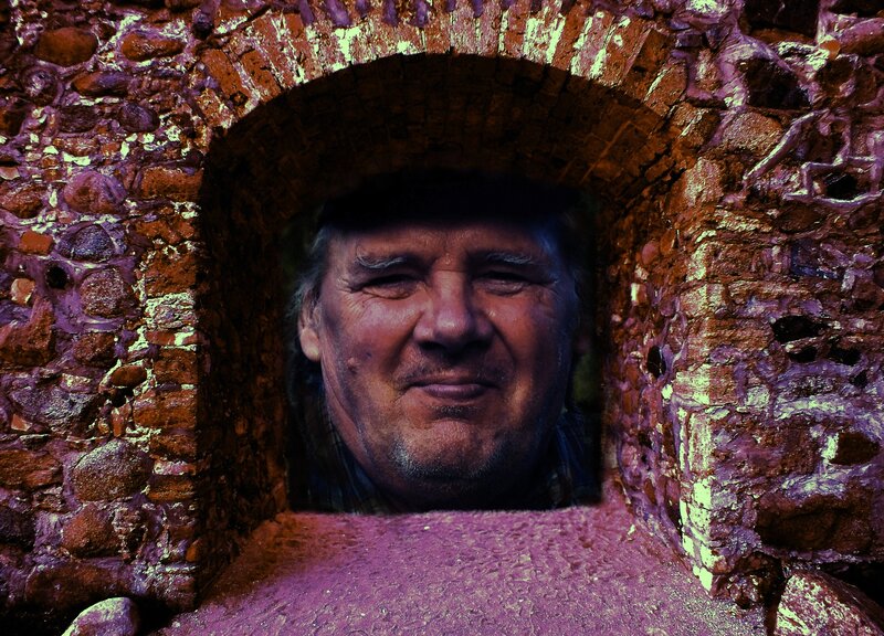 Man in Stone Window