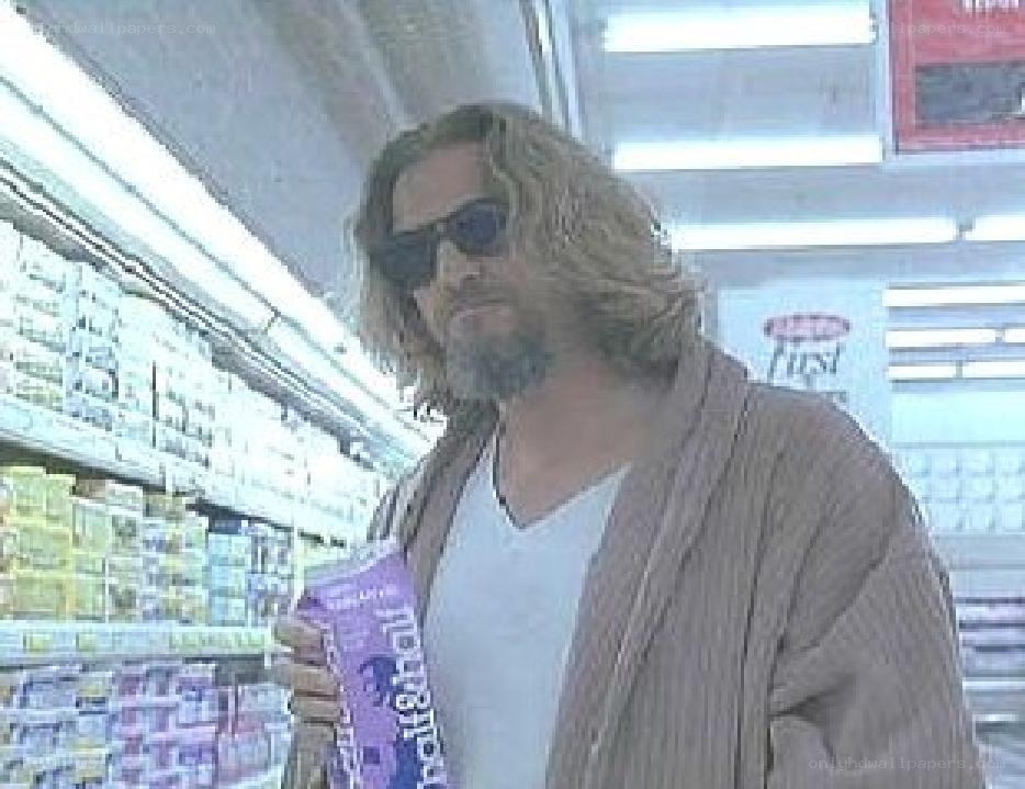 man in store holding snack
