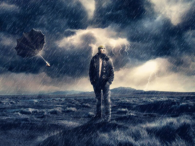 Man in Stormy Field