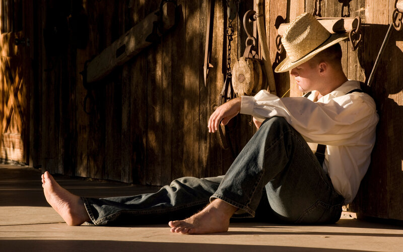 Man in Straw Hat — Brown, Dramatic