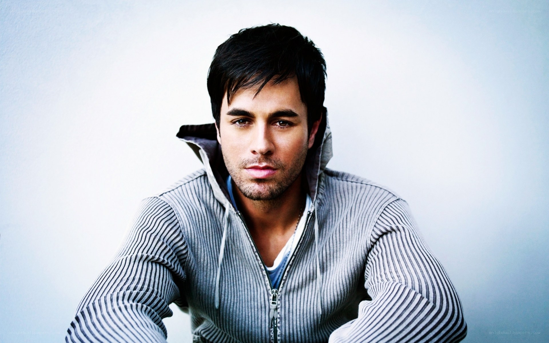man in striped hoodie