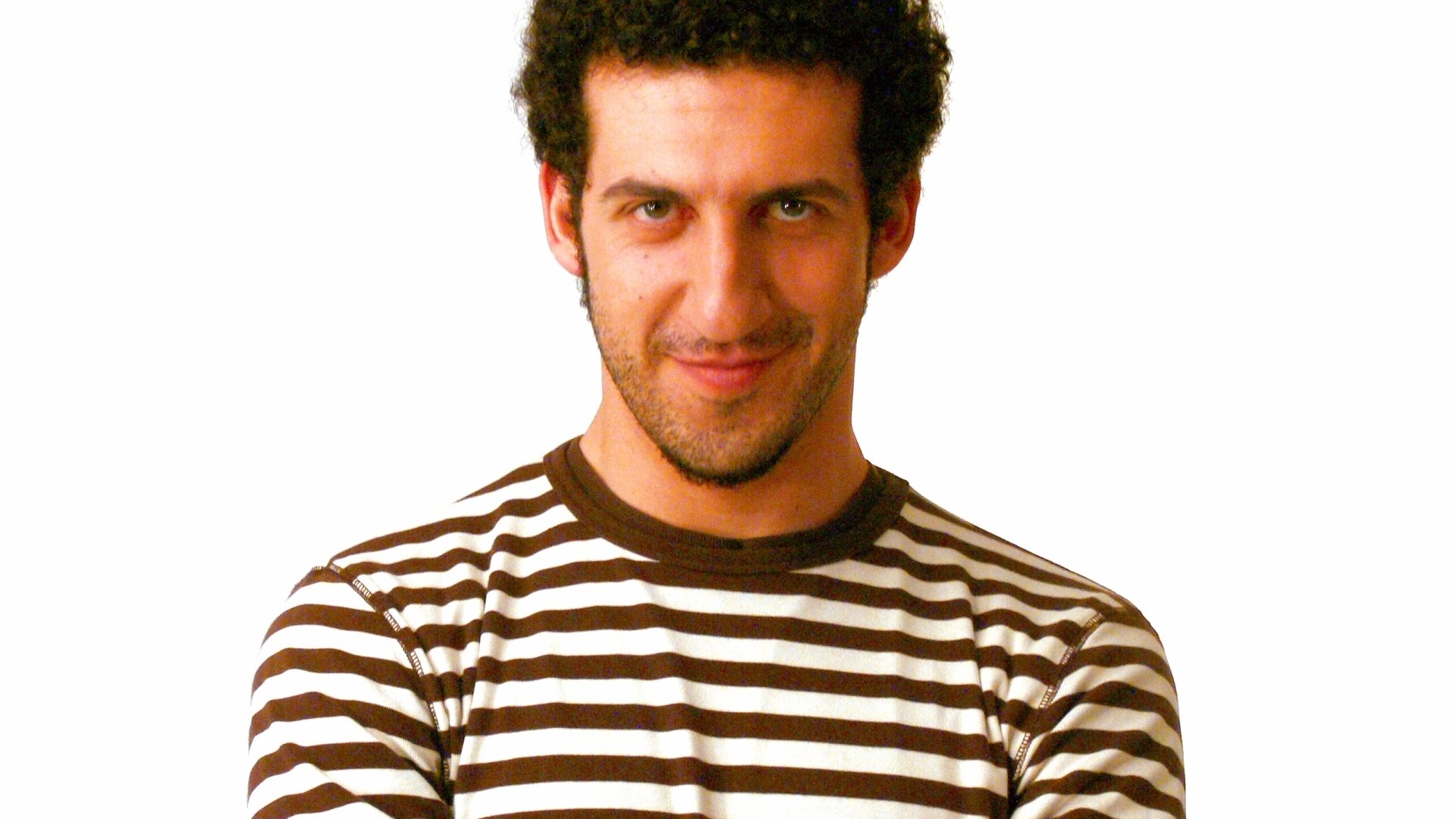 man in striped shirt