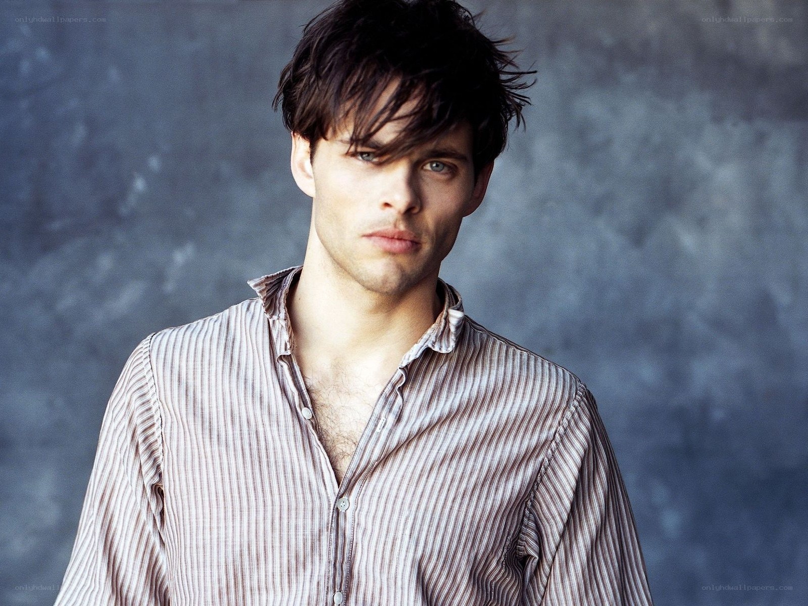 man in striped shirt