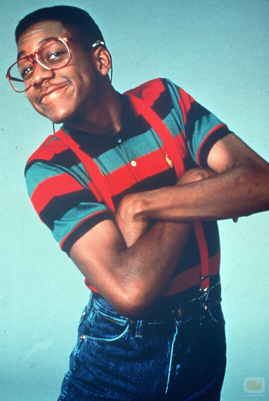 man in striped shirt and glasses