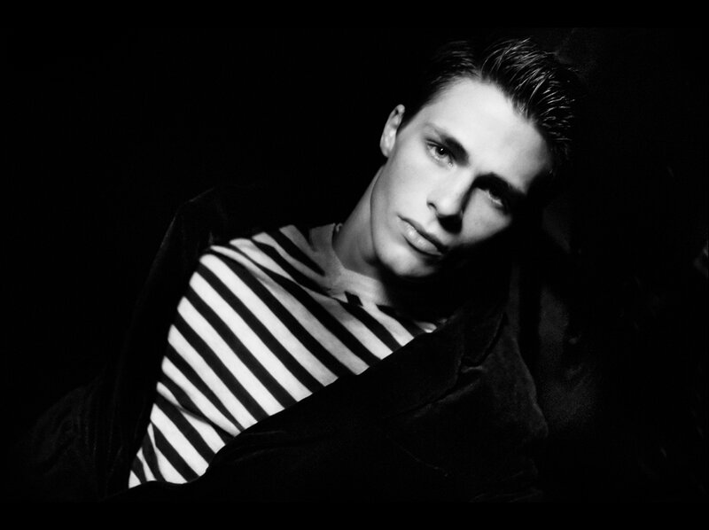 Man in Striped Shirt — Black, Dramatic, Photograph
