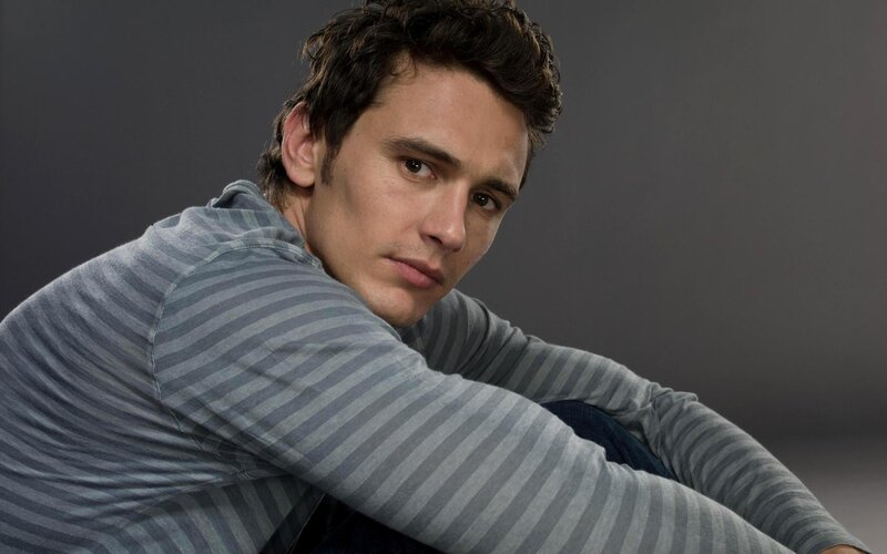 Man in Striped Shirt — Gray, Serious