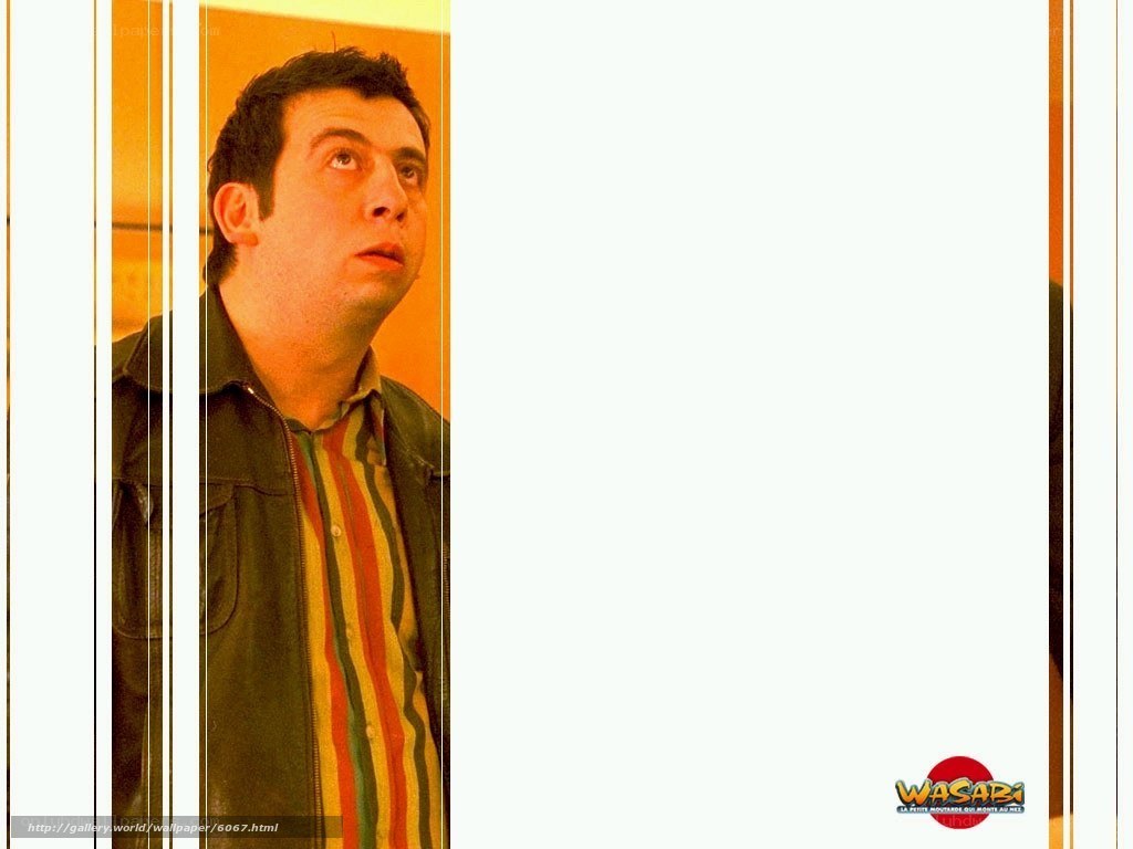 man in striped shirt looking up