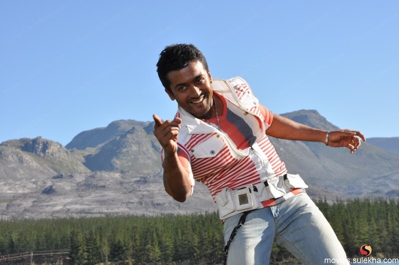 man in striped shirt outdoors