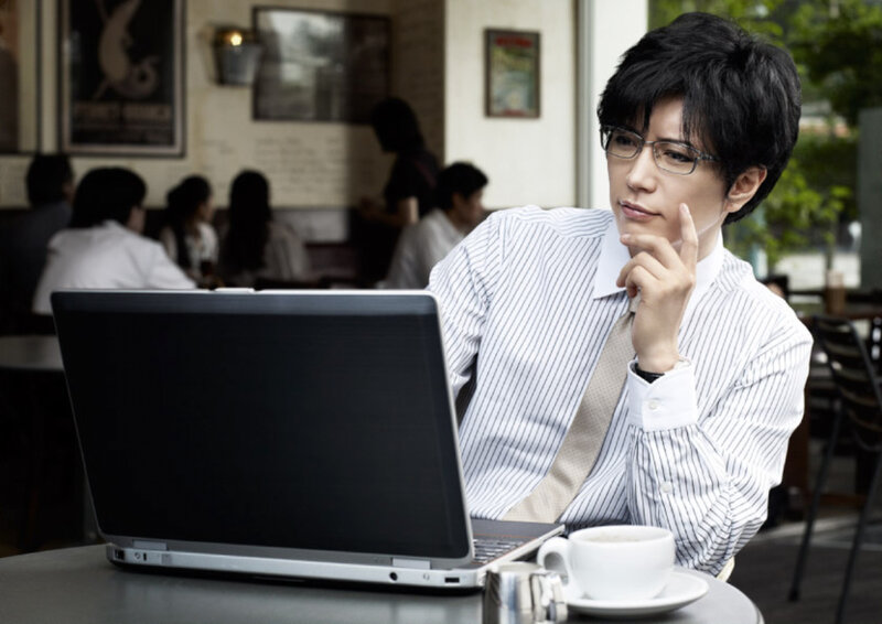 Man in Striped Shirt — White, Contemplative