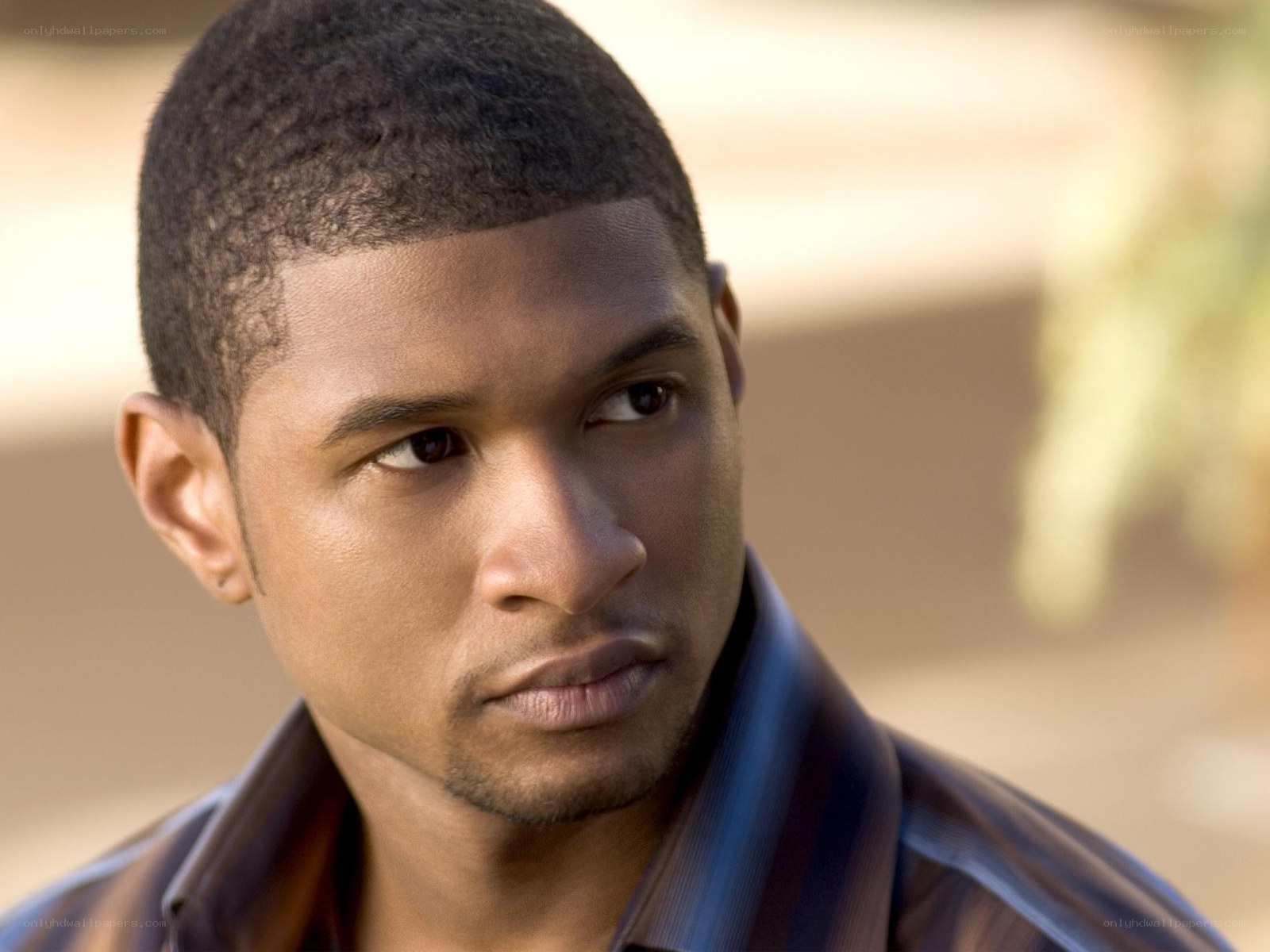 man in striped shirt