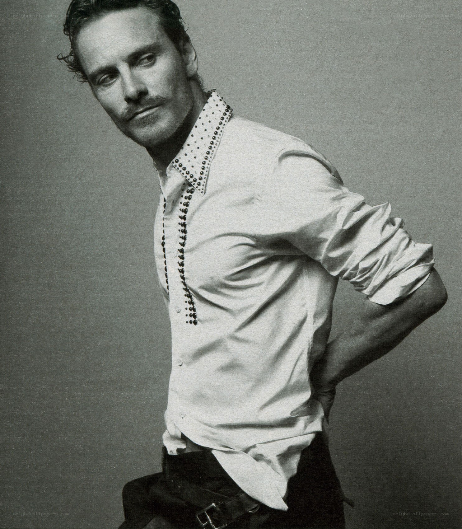 man in studded shirt