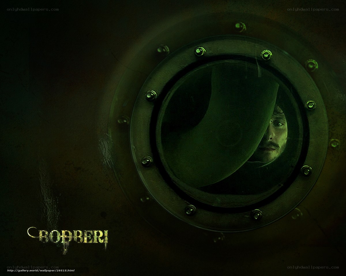 man in submarine porthole