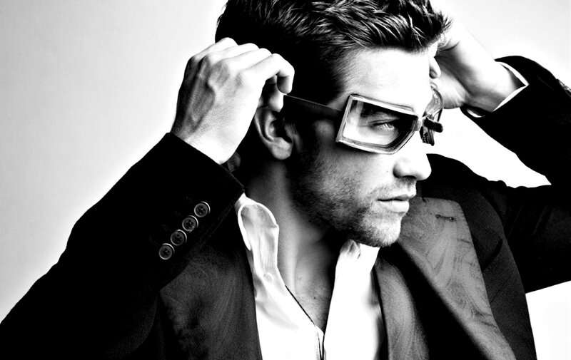 Man in Suit Adjusting Glasses — Black