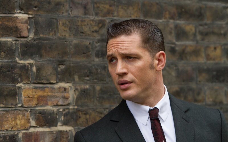 Man in Suit Against Brick Wall — Gray