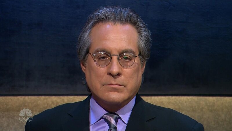 man in suit and glasses